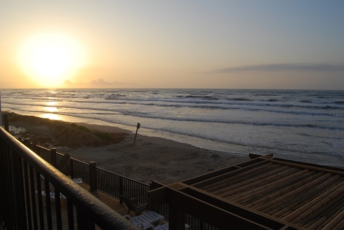 Photo of sunrise over Gulf at West Beach Grand Condominiums