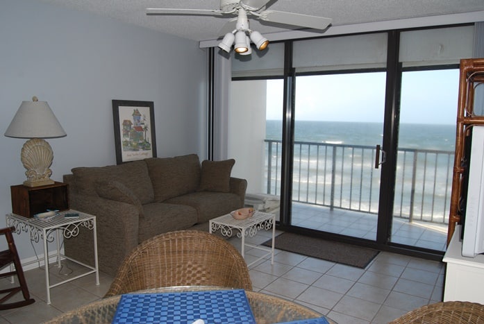 Photo of living room with view of Gulf from West Beach Grand Condominiums