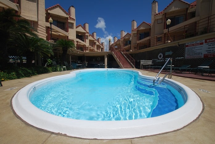 Photo of swimming pool at Palms Condominiums