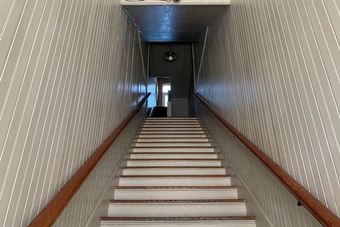 Photo of interior stair in Robinson Building Lofts