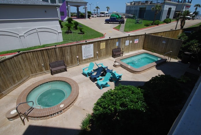 Photo of view of hot tub from private balcony at Victorian Condominiums