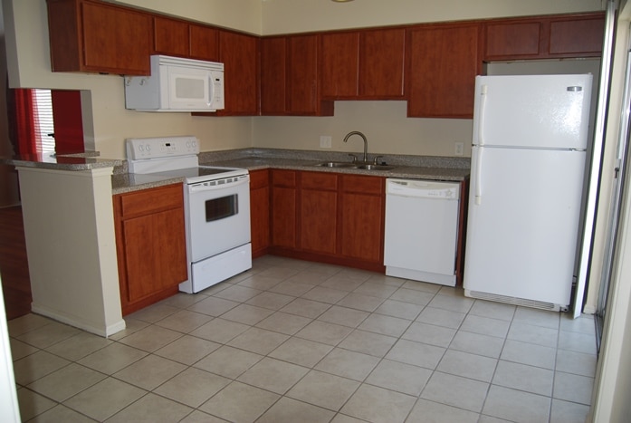 Photo of kitchen at Palms At Cove View Condominiums