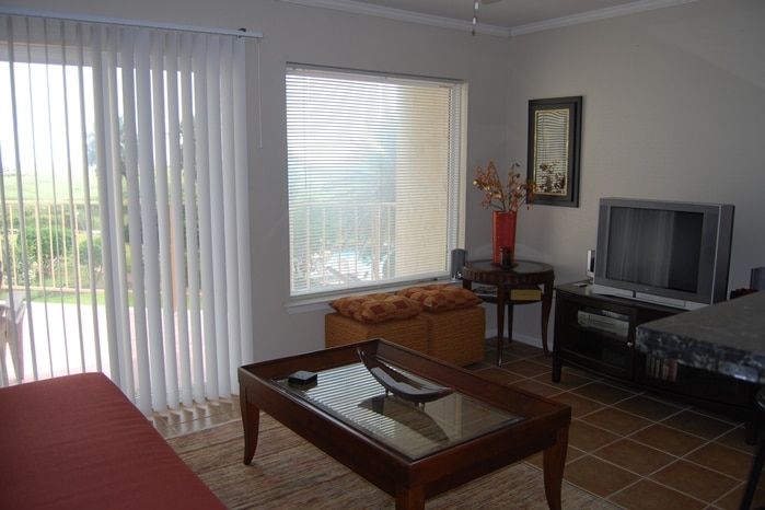 Photo of living room and window showing balcony at Maravilla Condominiums