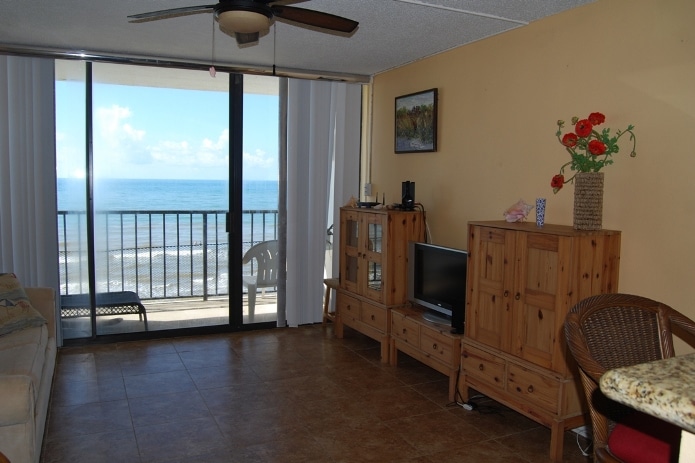 Photo of living room with view of Gulf from Riviera II Condominiums