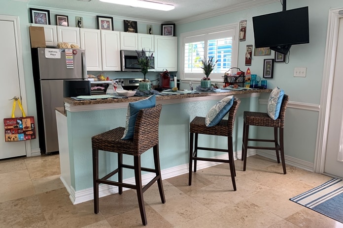 Photo of party room kitchen at Palms At Cove View Condominiums