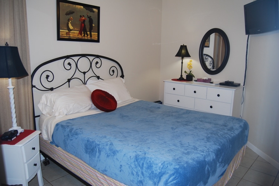 Photo of bedroom in a condo at Maravilla Condominiums