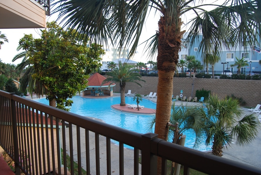 Photo of resort pool view from west side condo at Maravilla Condominiums